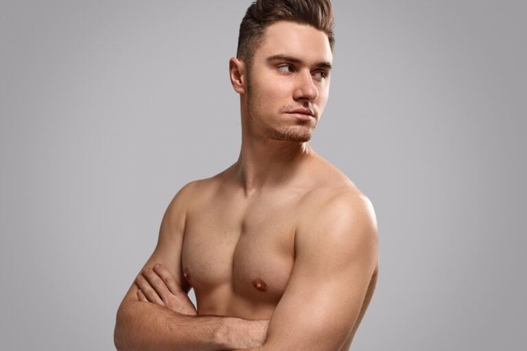 attractive young man posing shirtless