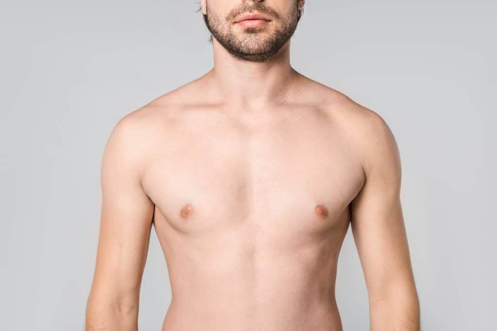 man with beard shirtless