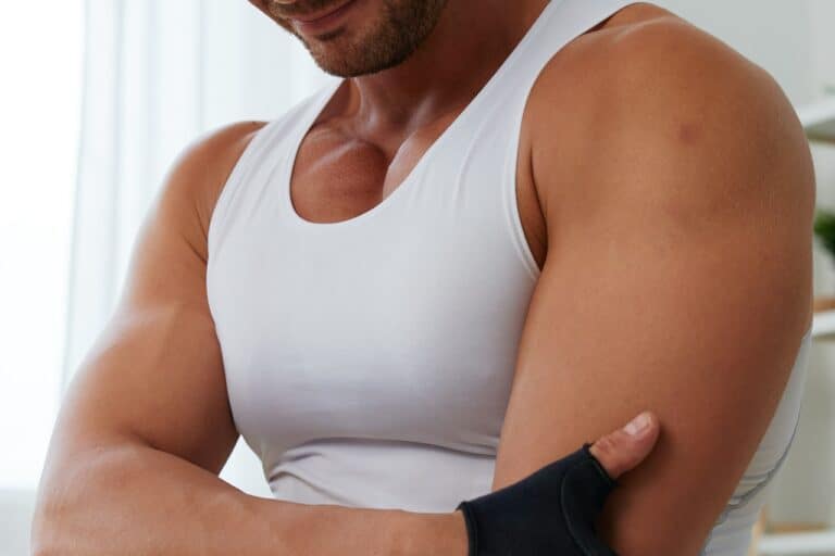 close up of man wearing white compression garment