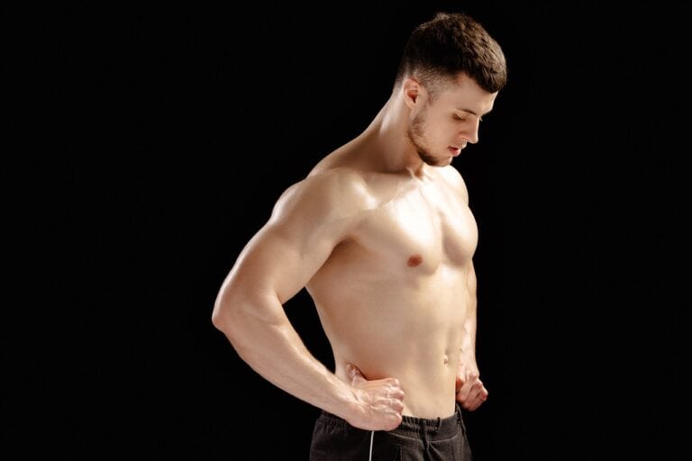 muscular man with chest gland tissue growth